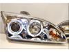 Ford Focus 2 (05-07) фары линзовые передние хромированные, со светящимися ободками, комплект 2 шт.
