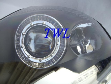 Mitsubishi Eclipse (00-05) фары передние линзовые черные, со светящимися ободками, комплект 2 шт.