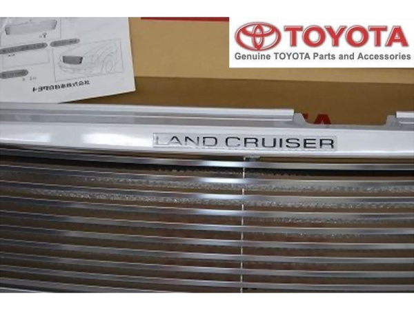 Toyota Land Cruiser 100 (98-03) решетка радиатора алюминиевая с логотипом "Land Cruiser", оригинал.