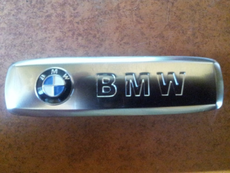 Эмблема BMW из полированного алюминия для ковриков салона - 1 шт., 18х64 мм