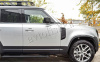 Land Rover Defender (20-) штатные выезжающие электропороги