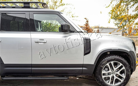 Land Rover Defender (20-) штатные выезжающие электропороги