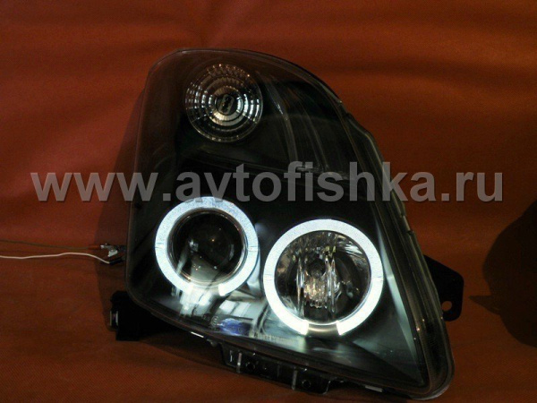 Toyota Yaris P2 (05-) фары передние линзовые черные, со светящимися ободками, комплект 2 шт.