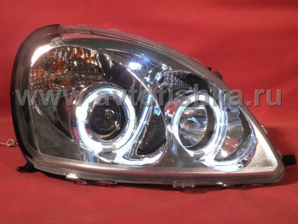 Toyota Yaris, Vitz (99-05) фары передние линзовые хромированные, со светящимися ободками, с электрокорректором, комплект 2 шт.