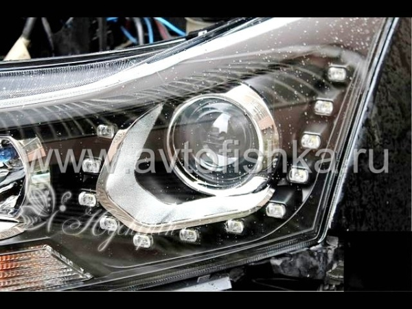 Chevrolet Cruze (08-) черные линзовые передние фары со светящимися ободками и диодной подсветкой в стиле Volkswagen, комплект 2 шт.