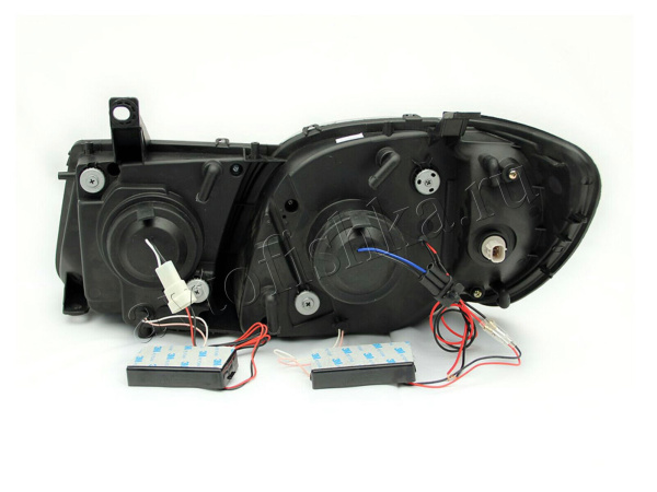 Lexus LX470 (98-07) фары передние линзовые черные, со светящимися ободками, комплект 2 шт.