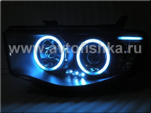Mitsubishi L200 Triton (2005-) фары передние линзовые со светящимися ободками, черные, комплект 2 шт.