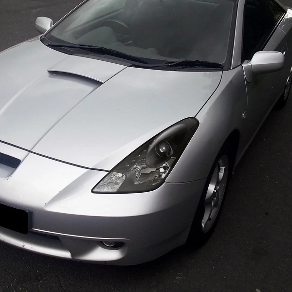 Toyota Celica 2000-2005 фары линзованные передние черные, с DRL ходовыми огнями