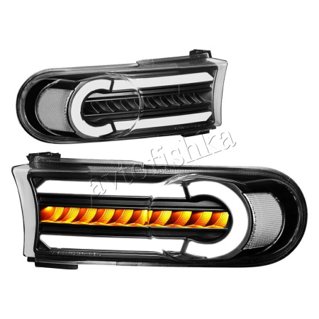 Toyota FJ Cruiser (07-14) черные светодиодные динамические поворотники с ДХО, комплект 2 шт.