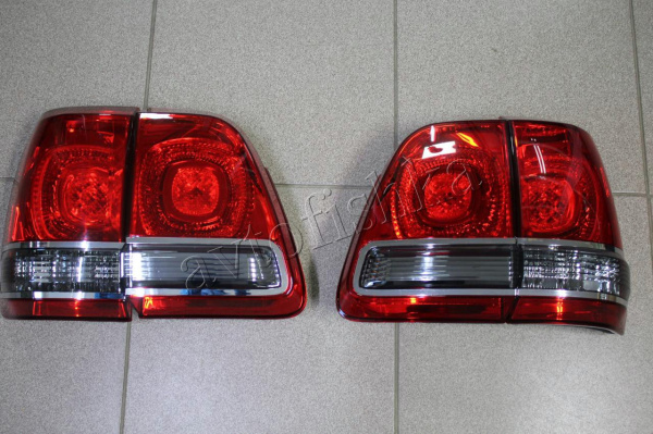 Toyota Land Cruiser 100 фонари задние светодиодные красно-тонированные, дизайн Land Cruiser 200, комплект лев.+прав.