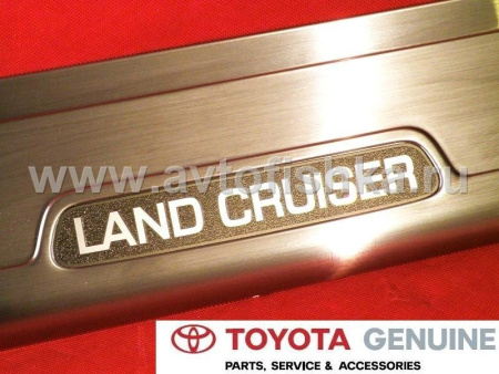 Toyota Land Cruiser 100 (98-05) накладка заднего бампера, нержавеющая сталь, с логотипом "Land Cruiser", оригинал.