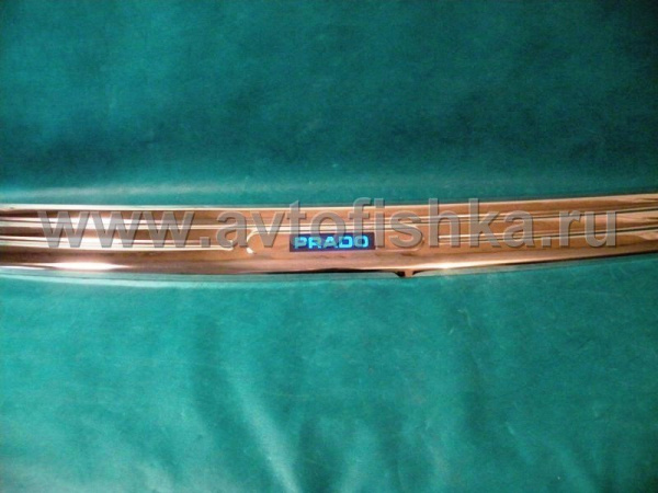 Toyota Land Cruiser Prado 120 (02-09) накладка заднего бампера верхняя, хромированная, со светящейся надписью "PRADO"