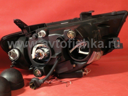 Mitsubishi L200 Triton (2005-) передние фары линзовые со светящимися ободками, черные, комплект 2 шт.