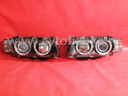 BMW 7 E38 (99-01) фары передние линзовые черные ксеноновые, с корректором, со светящимимся ободками, с тонированными поворотниками, комплект 2 шт.