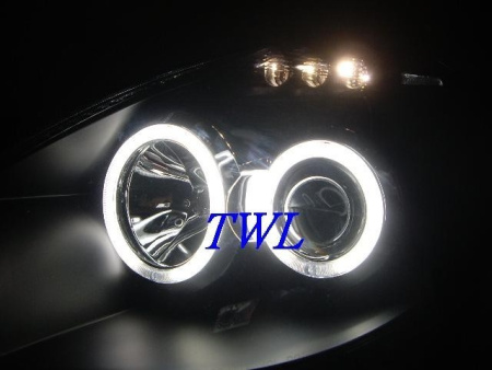 Nissan Tiida (04-) фары передние линзовые хромированные, со светящимися ободками, комплект 2 шт.