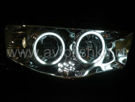 Mitsubishi L200 Triton (2005-) фары передние линзовые хромированные, со светящимися ободками, комплект 2 шт.