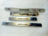 Daewoo Nexia накладки на пороги дверных проемов, из нержавеющей стали с надписью Daewoo, комплект 4 шт.