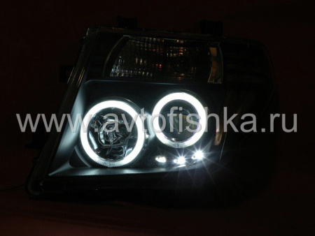 Nissan Pathfinder III, Navara (05-10) фары передние линзовые черные, со светящимися ободками, комплект 2 шт.