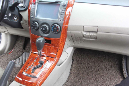 Toyota Corolla (2006-2013) накладки панелей салона, дизайн под дерево, левый руль, комплект 14 предметов.