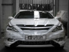 Hyundai Sonata YF (10-) спортивный бампер с решеткой радиатора и ресничками на фары, дизайн FNB