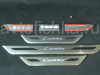 Toyota Camry V40 (2006-) накладки порогов дверных проемов, из нержавеющей стали с подсветкой CAMRY.