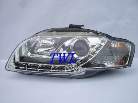 Audi A4 (05-07) передние линзовые фары хромированные, со светодиодной подсветкой, с электрокорректором, комплект 2 шт.