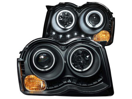 Jeep Grand Cherokee (08-09) черные передние фары тюнинг со светящимися ободками, комплект 2 шт.