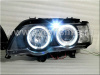 BMW X5 (98-03) фары передние линзовые черные, со светящимися ободками, с электрокорректором, комплект 2 шт.