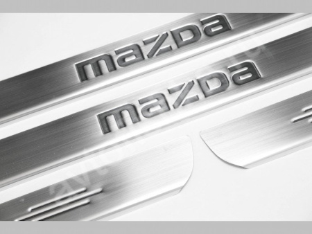 Mazda 3 (2009-) накладки на пороги из нержавеющей стали, 4 шт.