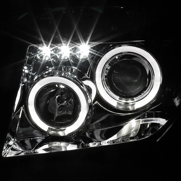 Nissan Pathfinder III, Navara (05-10) фары передние линзовые хромированные, со светящимися ободками, комплект 2 шт.