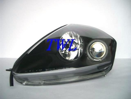 Mitsubishi Eclipse (00-05) передние линзовые фары черные, со светящимися ободками, комплект 2 шт.