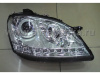 Mercedes ML W164 (05-08) фары передние линзовые хромированные, со светящимися ободками и с нижней светодиодной подсветкой, с мотором электрокорректора, комплект 2 шт.
