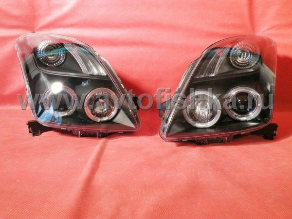 Toyota Yaris P2 (05-) фары передние линзовые черные, со светящимися ободками, комплект 2 шт.