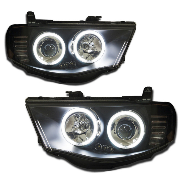 Mitsubishi L200 Triton (05-) фары передние линзовые внутри черные, со светящимися ободками, комплект 2 шт.